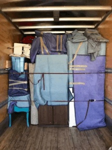 Careful packing of items with professional residential movers in Calgary